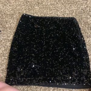 H&M mini skirt. Lots of sequins, black color